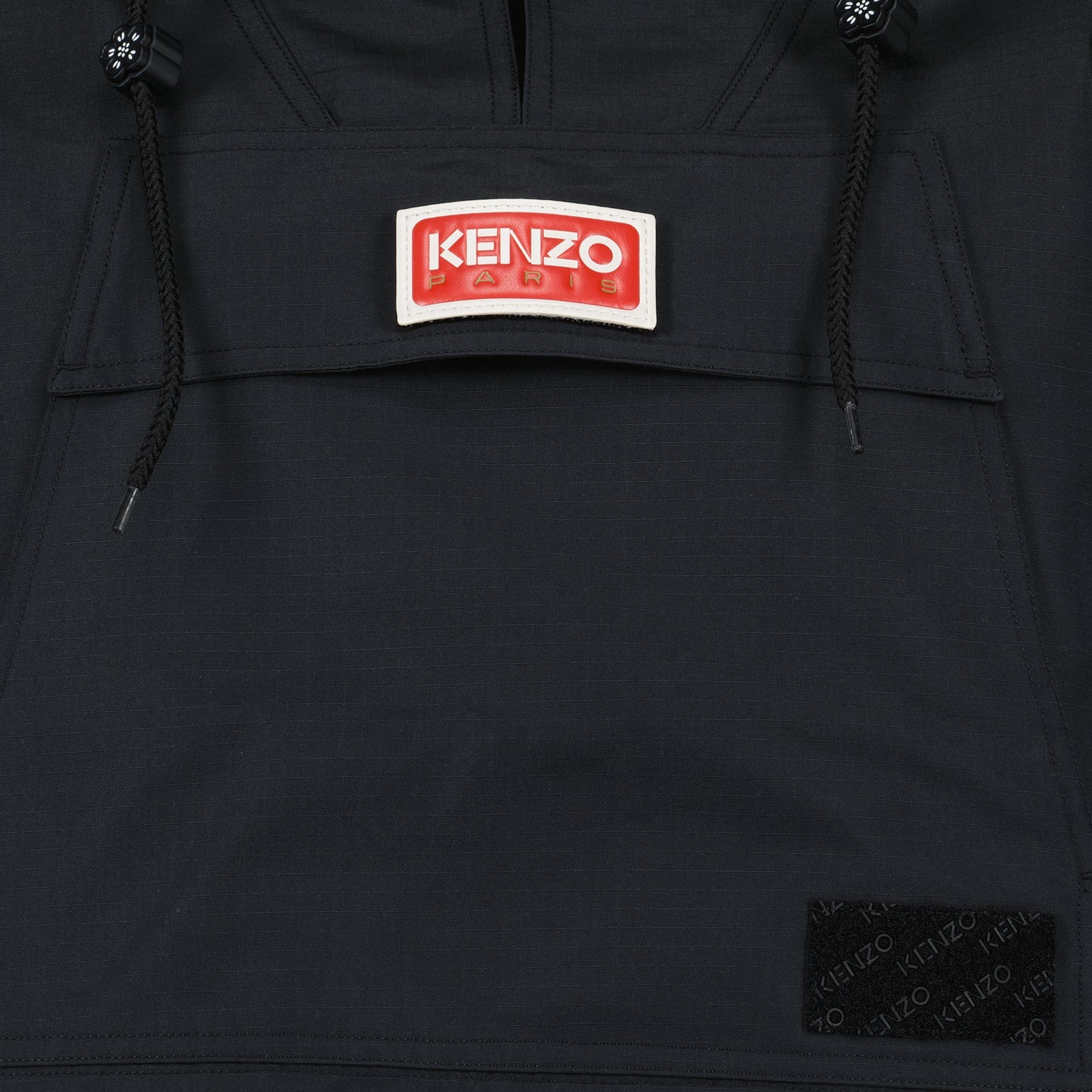 Kenzo windbreaker, women's luxury outerwear, black windbreaker, designer logo jackets, high-end fashion