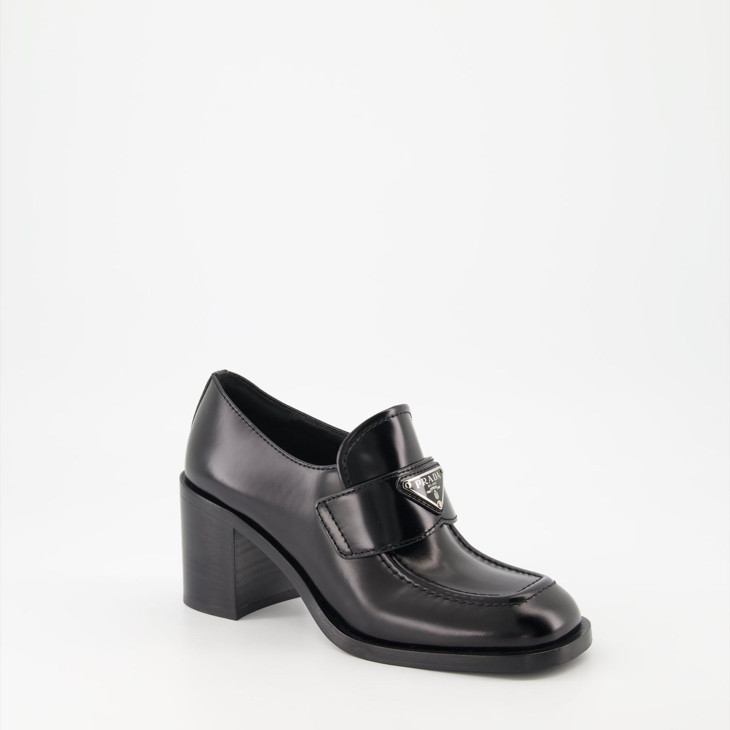 Prada leather moccasins, high-heeled moccasins, women's luxury shoes, polished leather footwear, designer moccasins