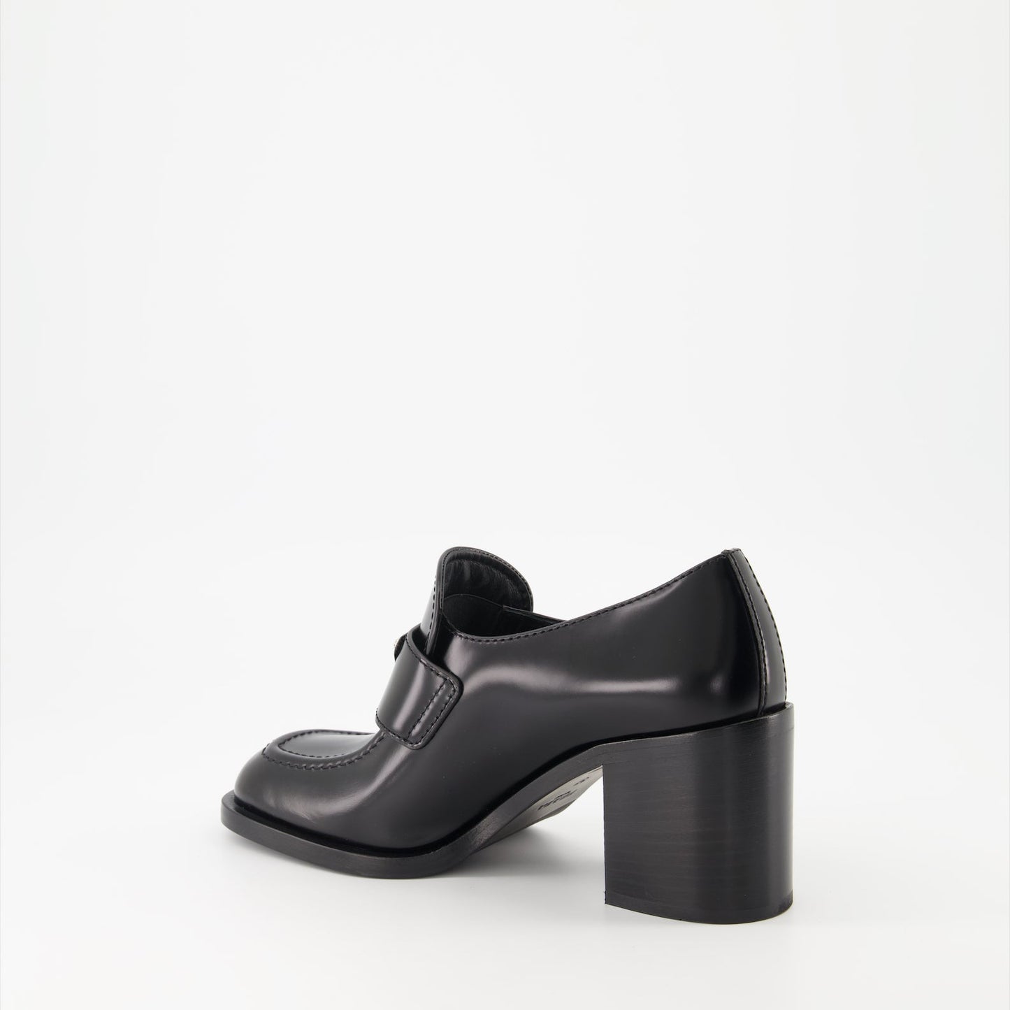 Prada leather moccasins, high-heeled moccasins, women's luxury shoes, polished leather footwear, designer moccasins