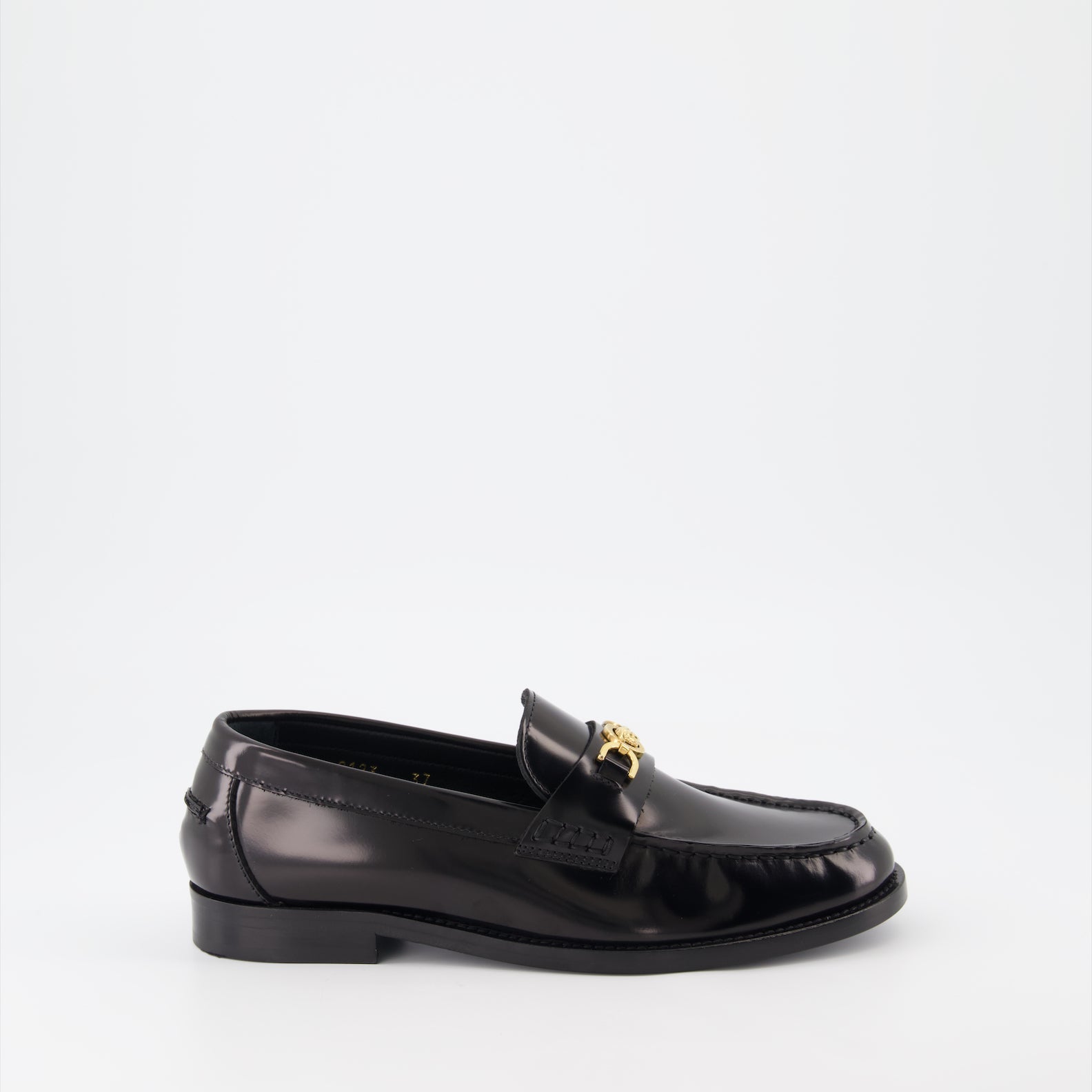 Versace moccasins, luxury women's footwear, Medusa emblem shoes, black leather moccasins, high-end women's shoes