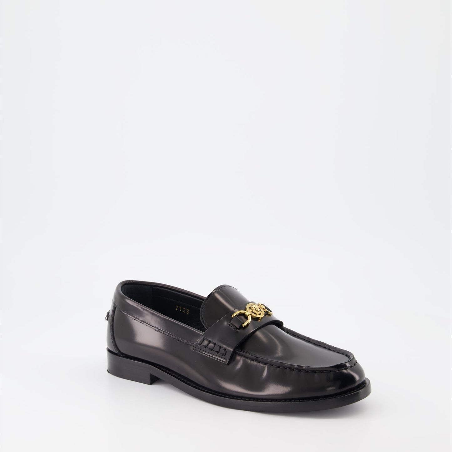 Versace moccasins, luxury women's footwear, Medusa emblem shoes, black leather moccasins, high-end women's shoes