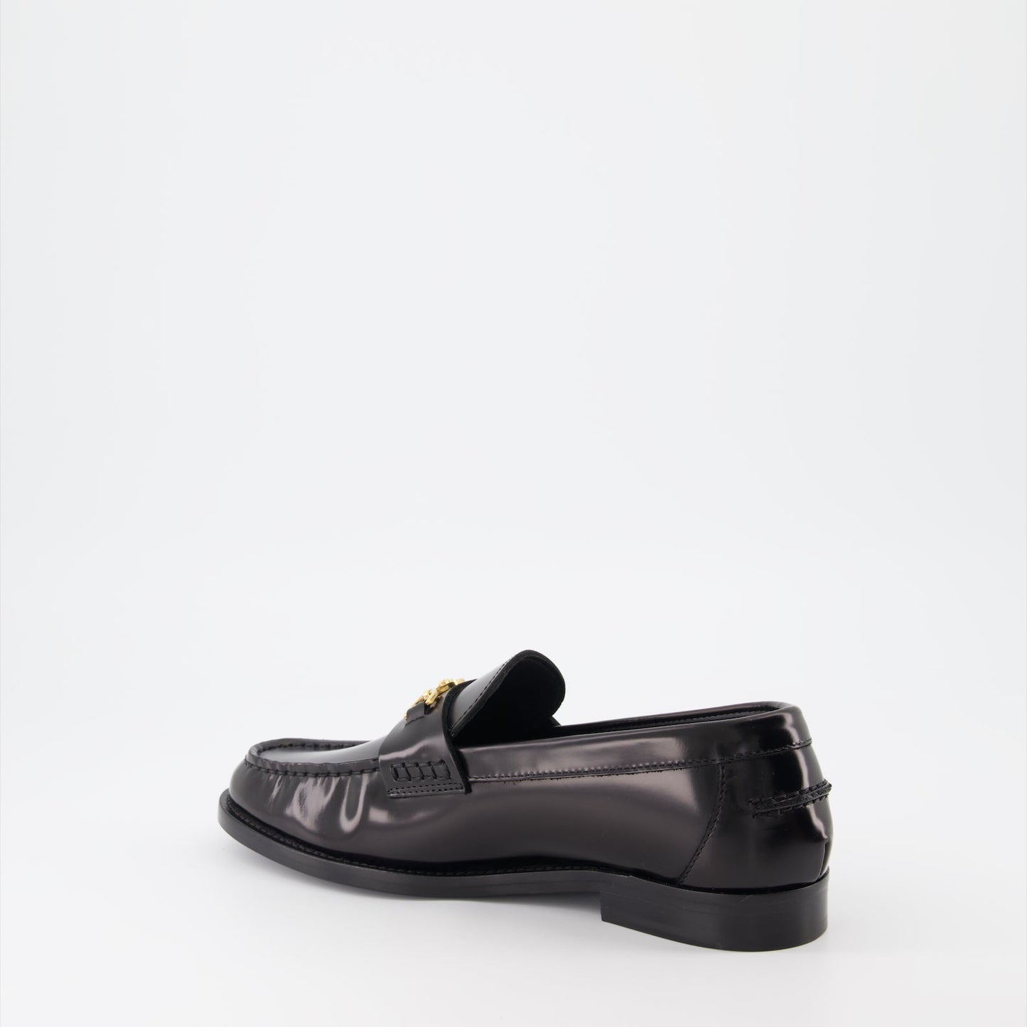 Versace moccasins, luxury women's footwear, Medusa emblem shoes, black leather moccasins, high-end women's shoes