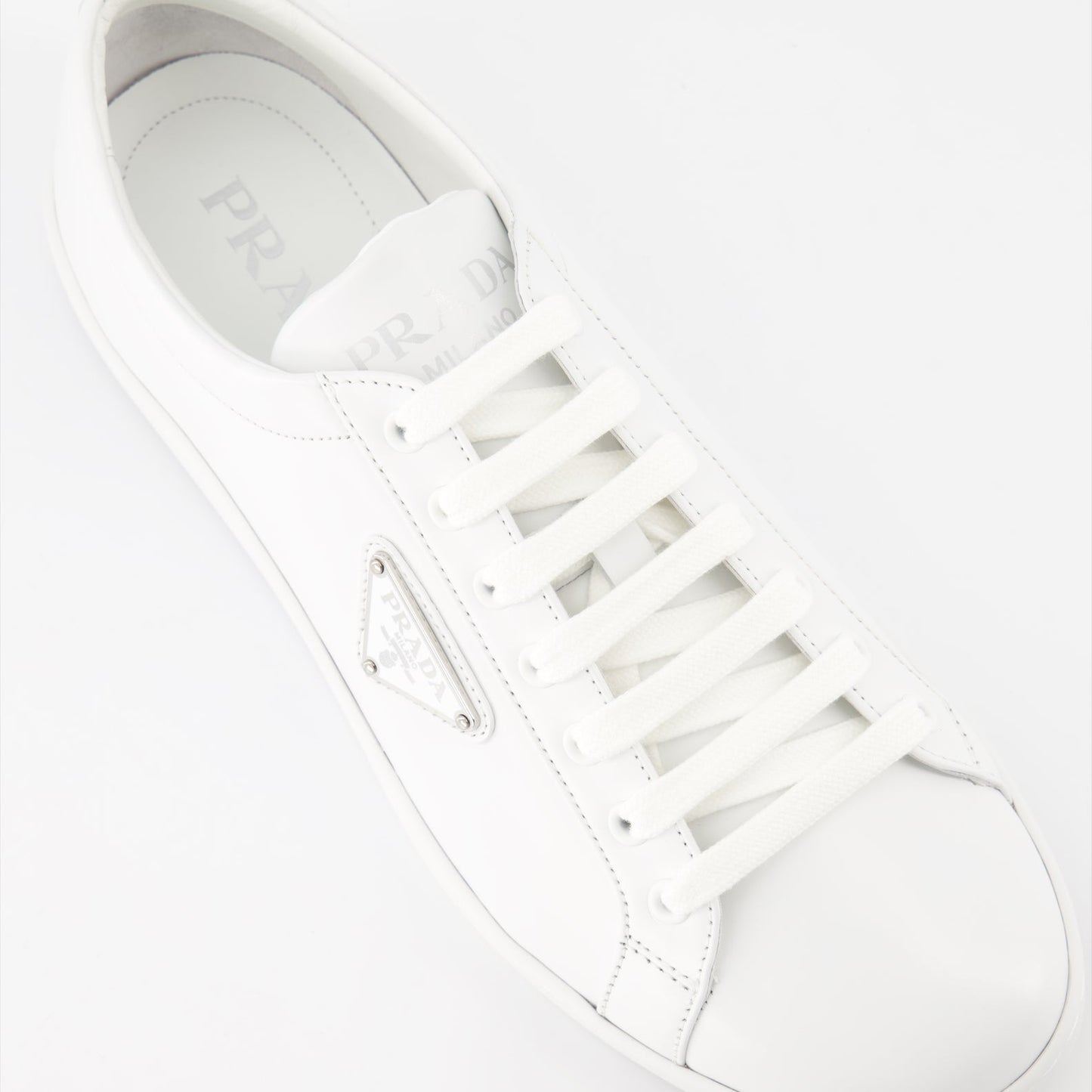   Prada sneakers, white leather sneakers, luxury men's footwear, elegant casual shoes, high-end sneakers  