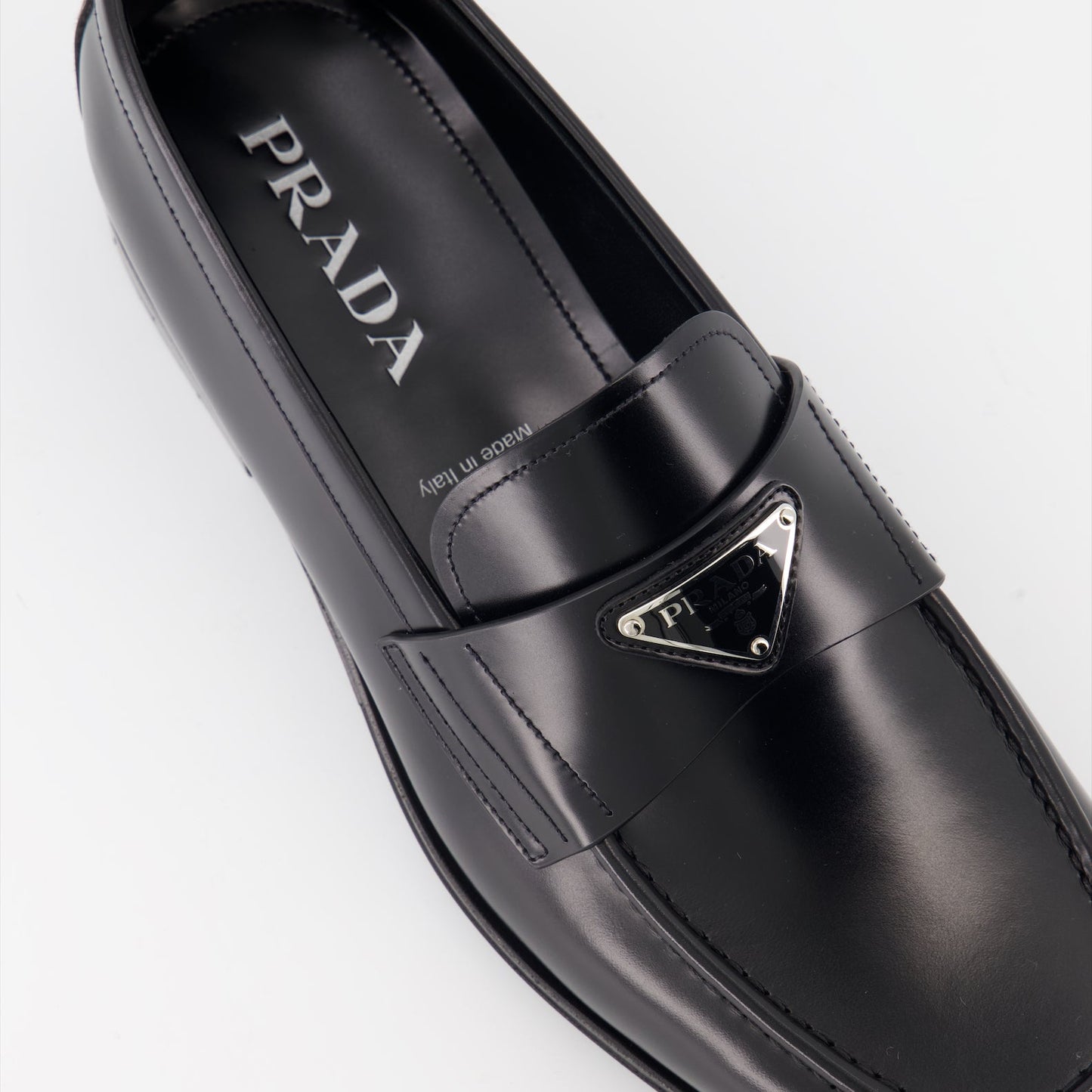 Prada moccasins, luxury leather footwear, men's designer shoes, elegant moccasins, high-end fashion