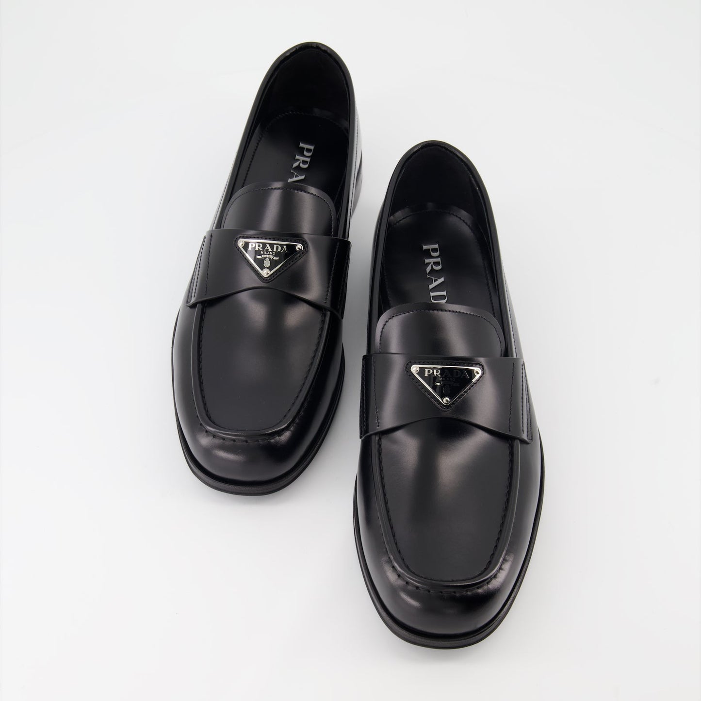 Prada moccasins, luxury leather footwear, men's designer shoes, elegant moccasins, high-end fashion