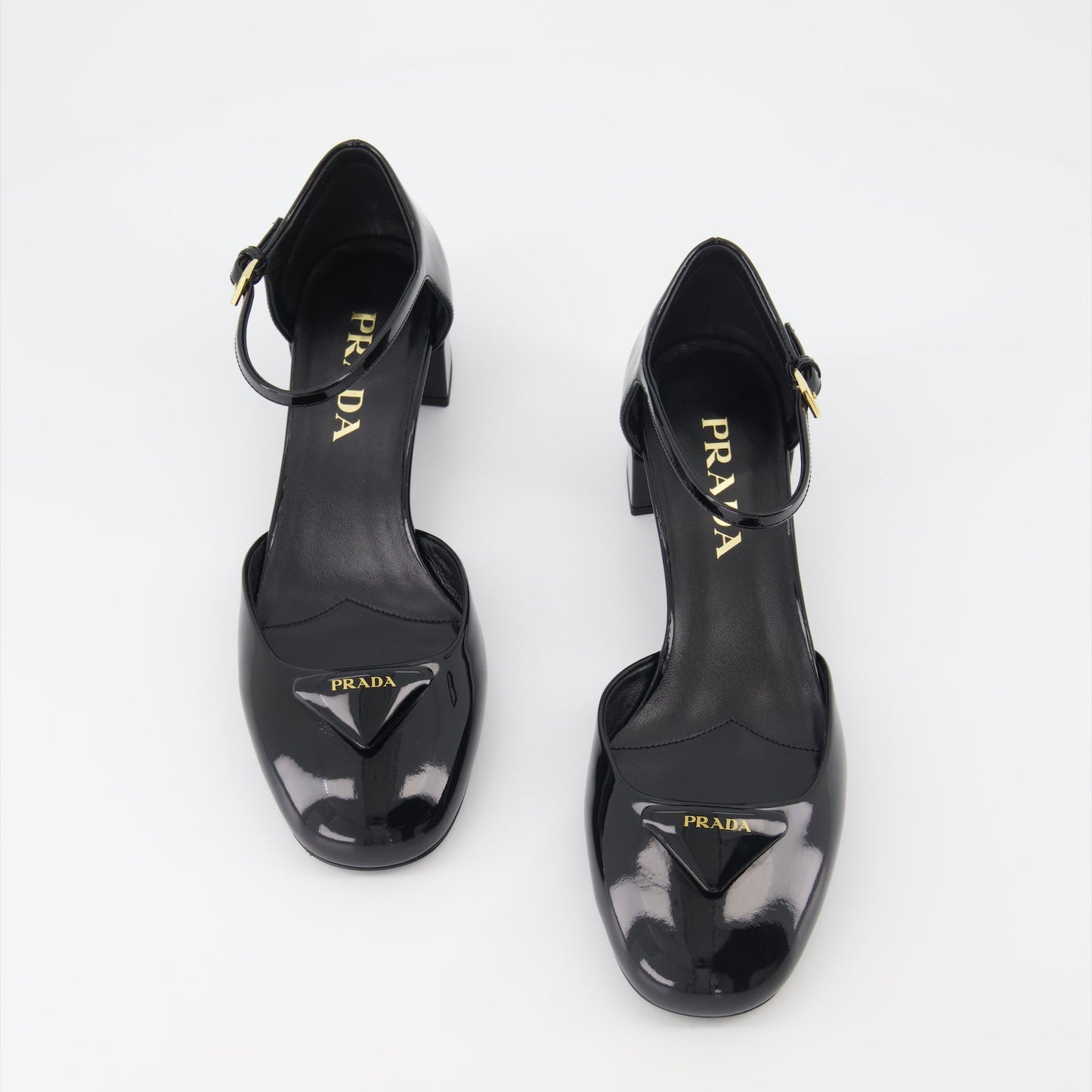 Prada stiletto heels, black patent leather shoes, luxury women's footwear, high-end stiletto shoes, elegant evening heels