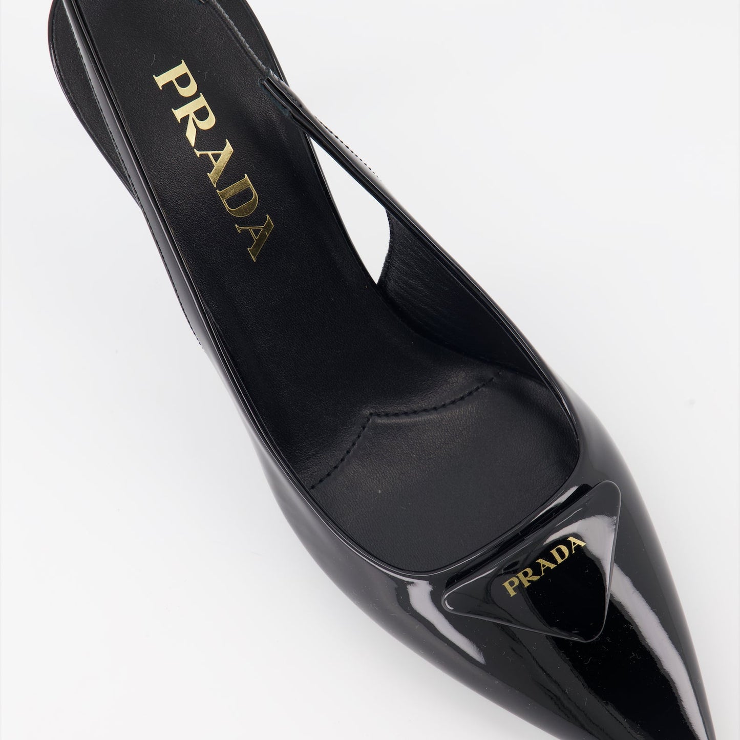 Prada, black leather pumps, luxury footwear, elegant shoes, sophisticated design