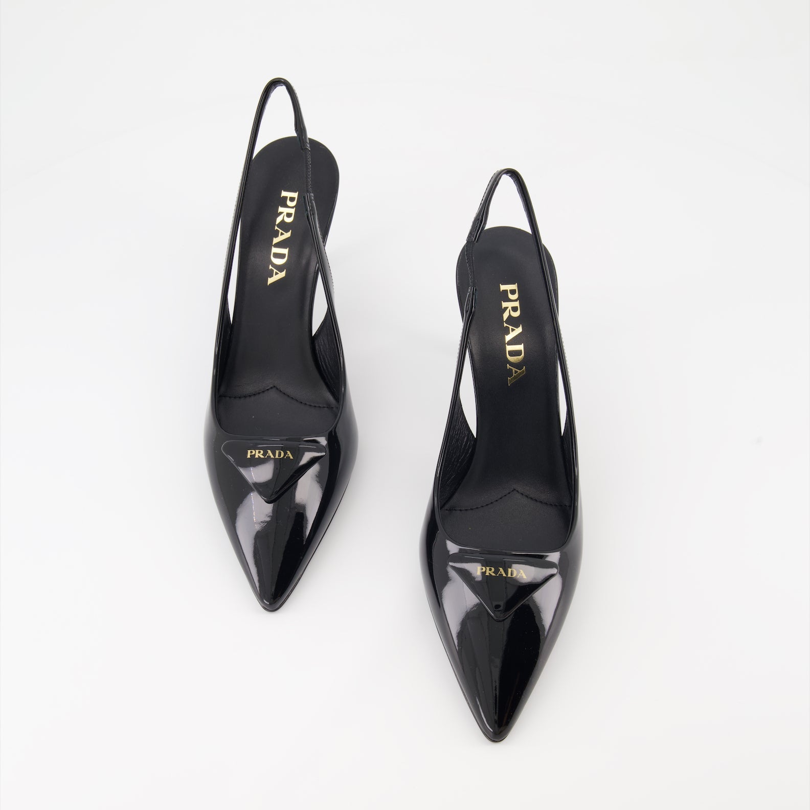 Prada, black leather pumps, luxury footwear, elegant shoes, sophisticated design