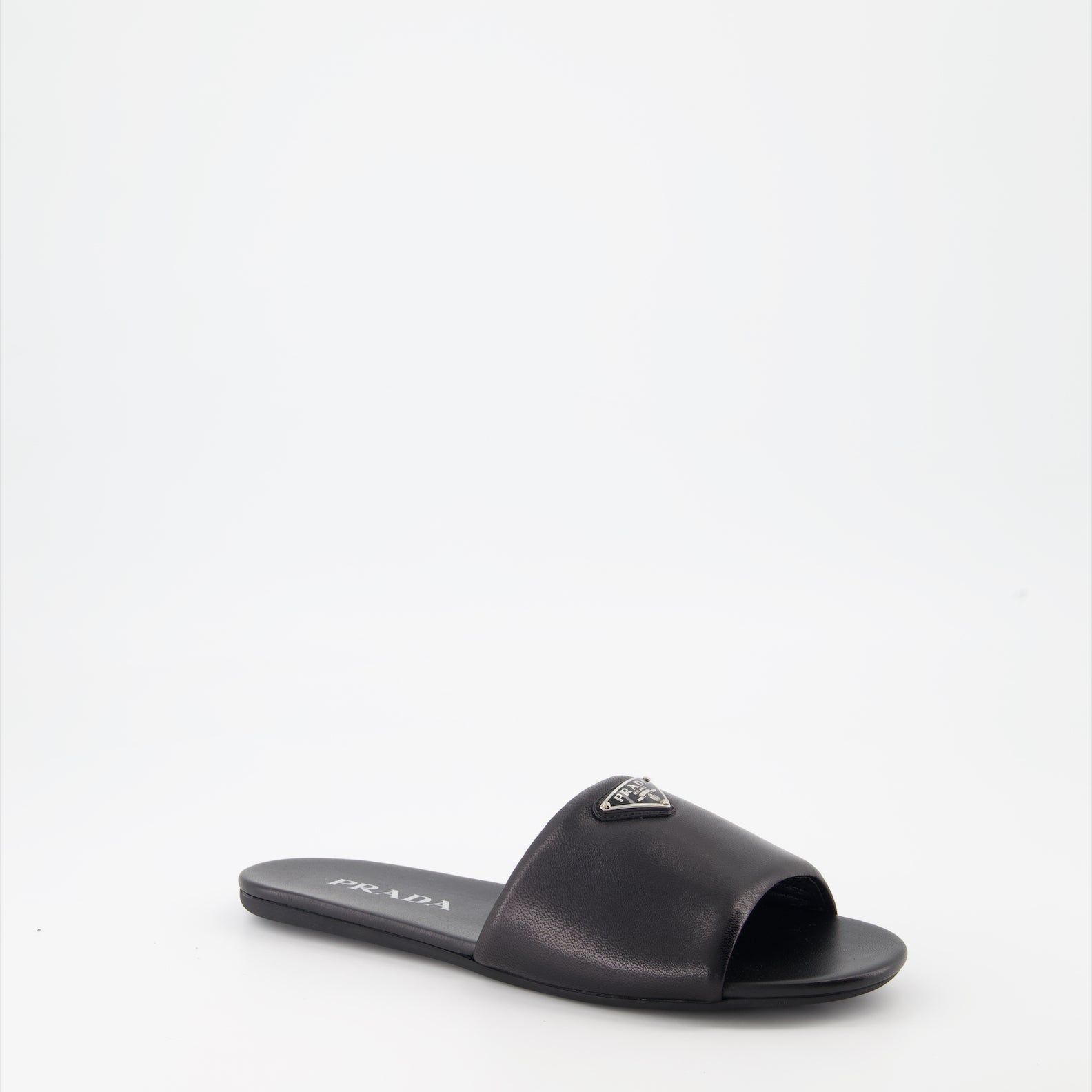 Prada, black leather slides, luxury footwear, nappa leather, designer slides