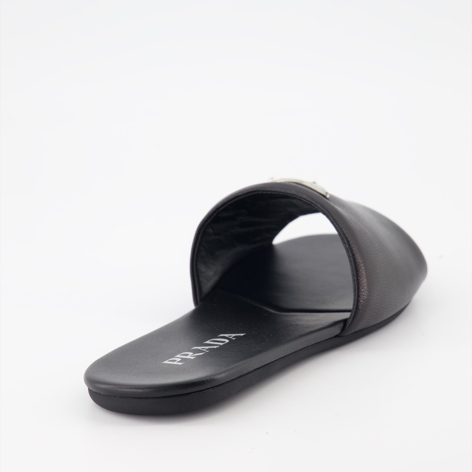 Prada, black leather slides, luxury footwear, nappa leather, designer slides