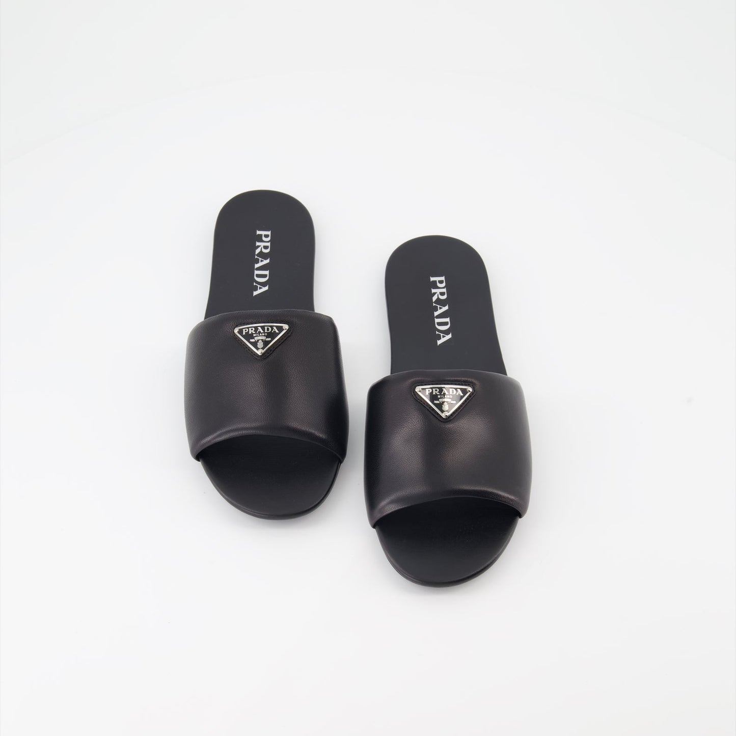 Prada, black leather slides, luxury footwear, nappa leather, designer slides