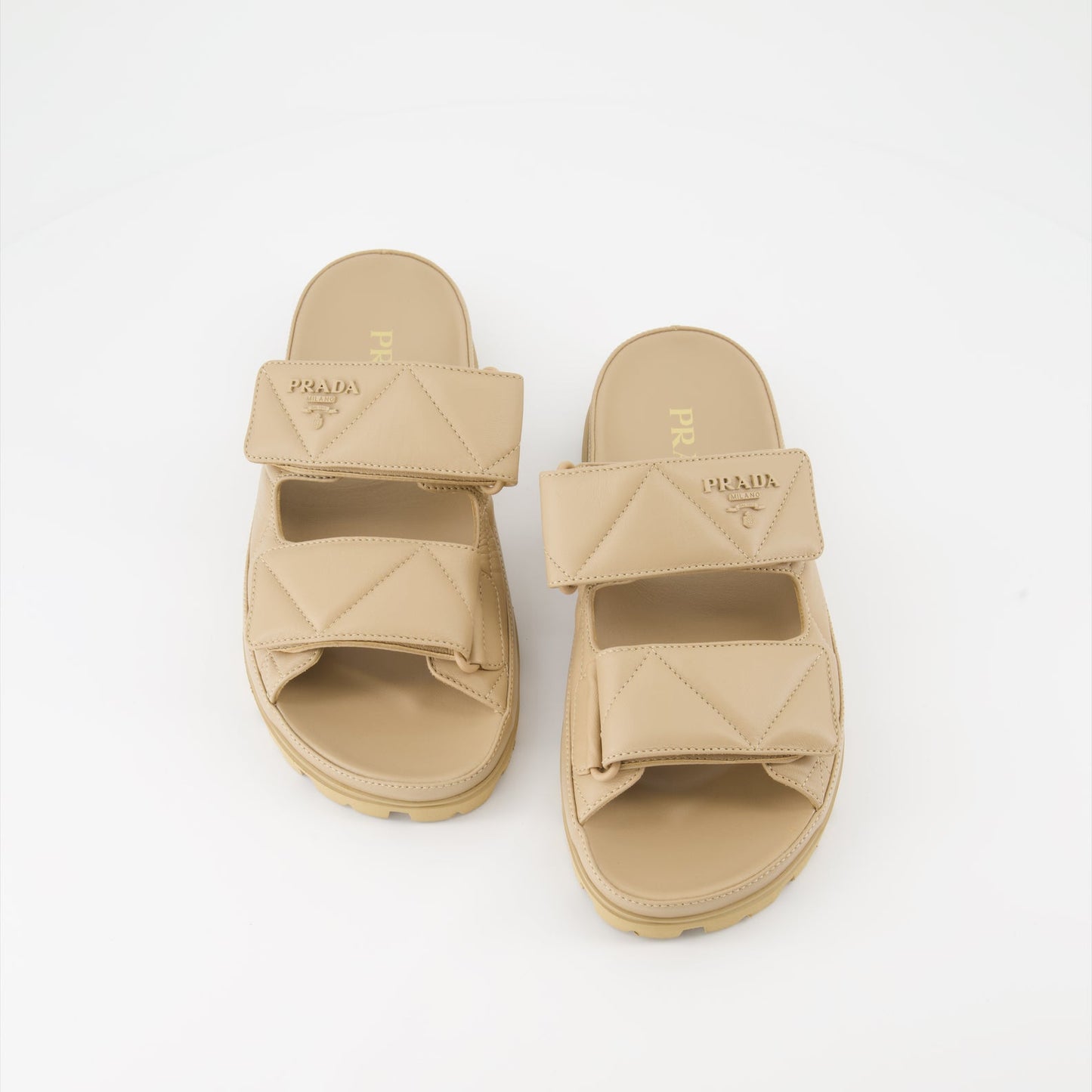 Prada slides, Quilted leather slides, Nappa leather footwear, Luxury slides, Designer comfort footwear