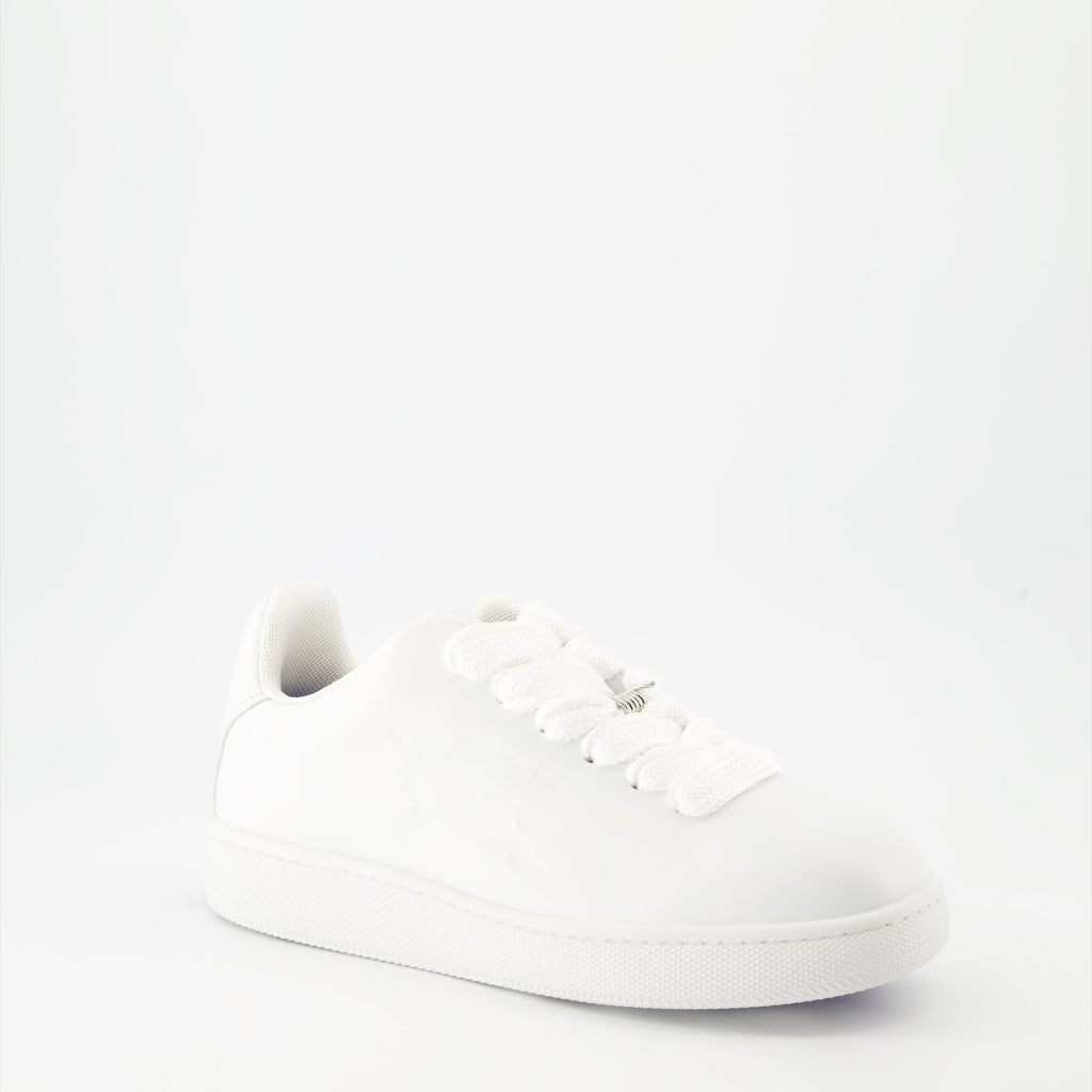 White leather sneakers, Burberry EKD, luxury footwear, stylish sneakers, elegant leather sneakers