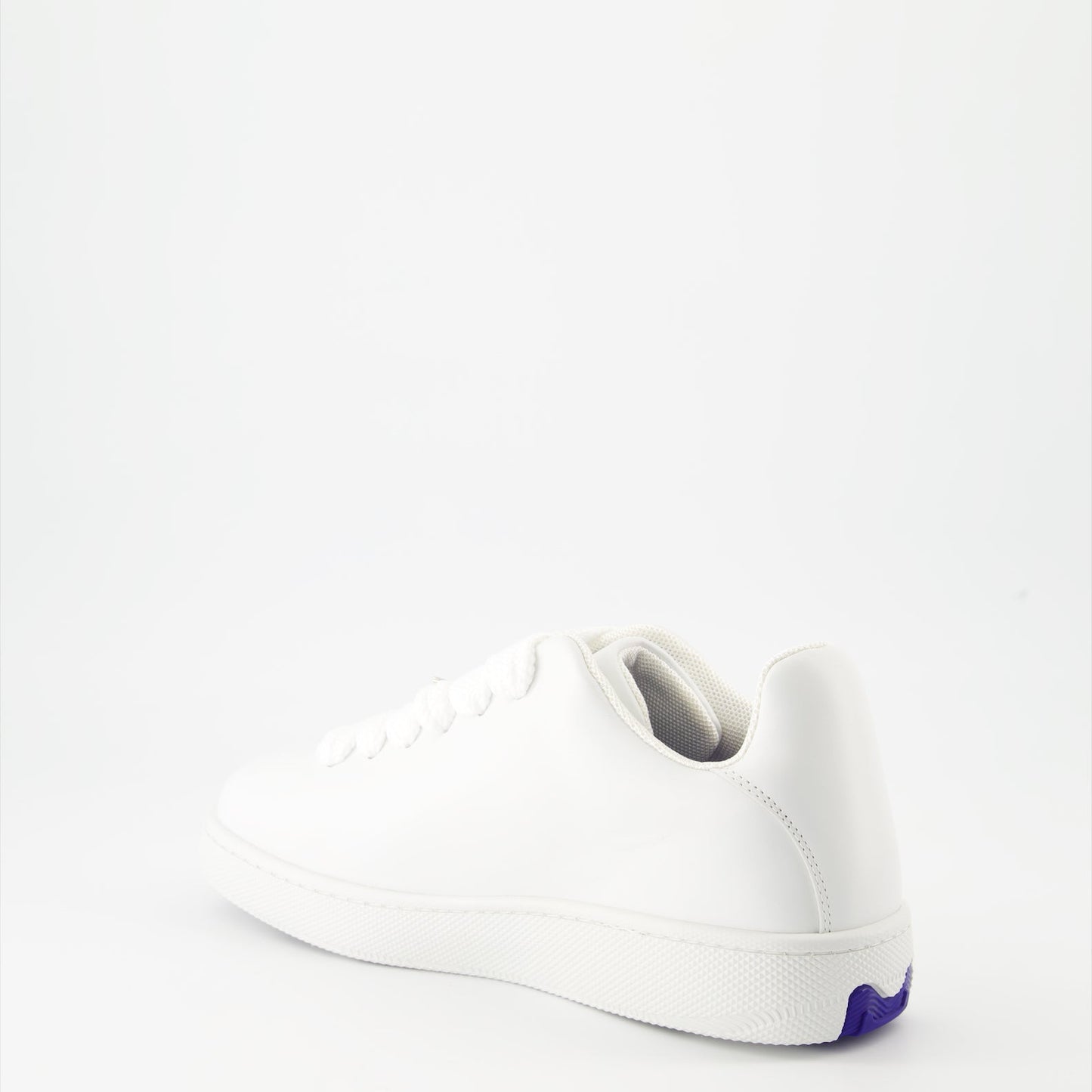 White leather sneakers, Burberry EKD, luxury footwear, stylish sneakers, elegant leather sneakers