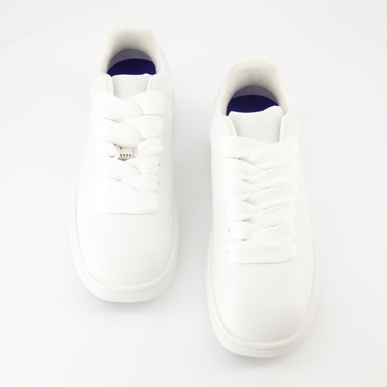 White leather sneakers, Burberry EKD, luxury footwear, stylish sneakers, elegant leather sneakers