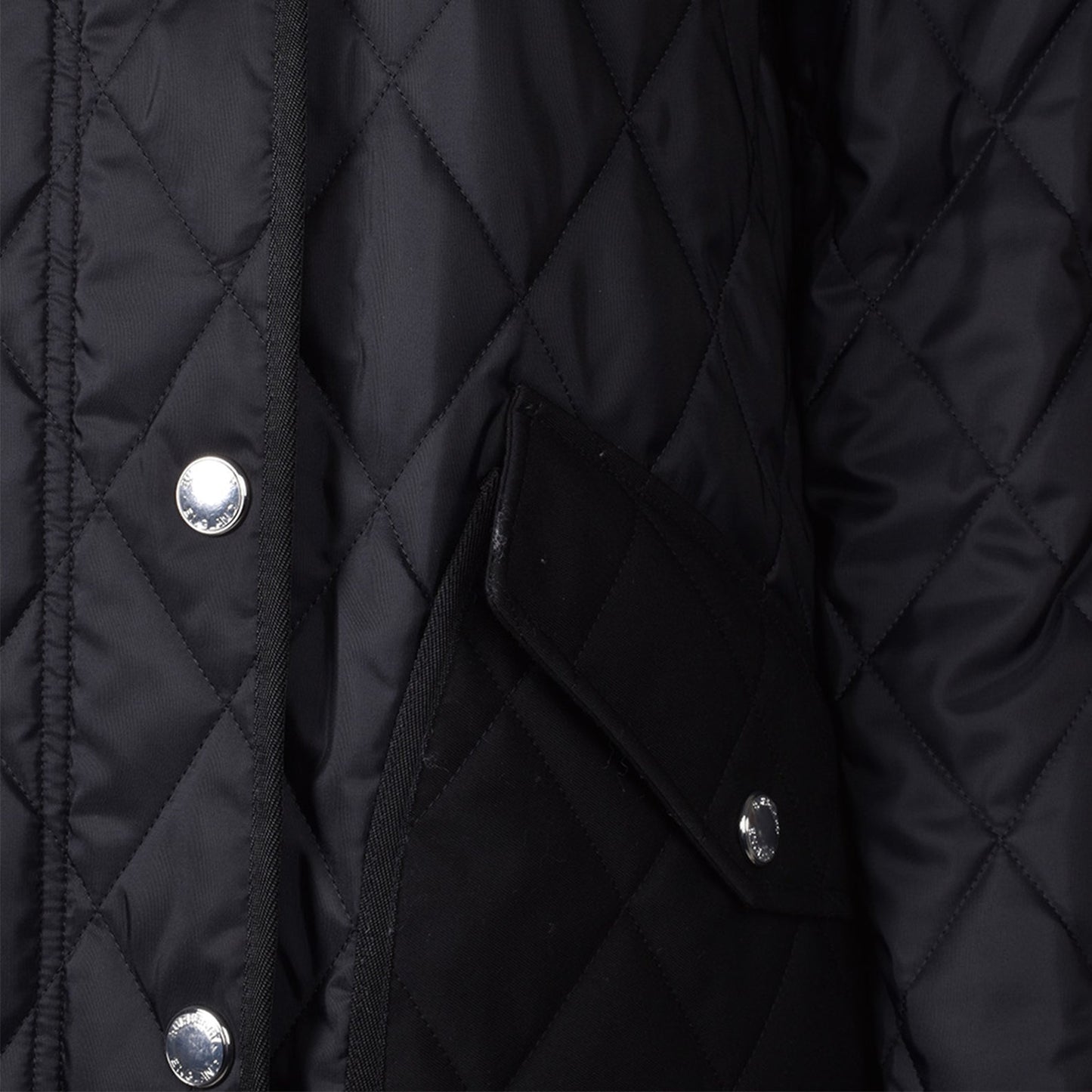 Quilted parka, luxury outerwear, Burberry fashion, nylon parka, sophisticated jacket