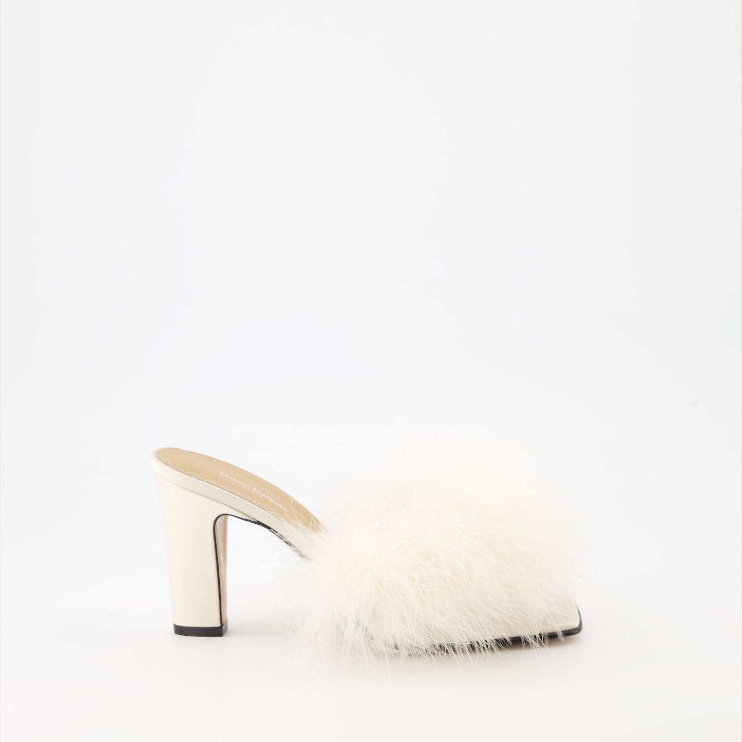 Maison Margiela, feather-trimmed mules, luxury footwear, designer shoes, elegant mules