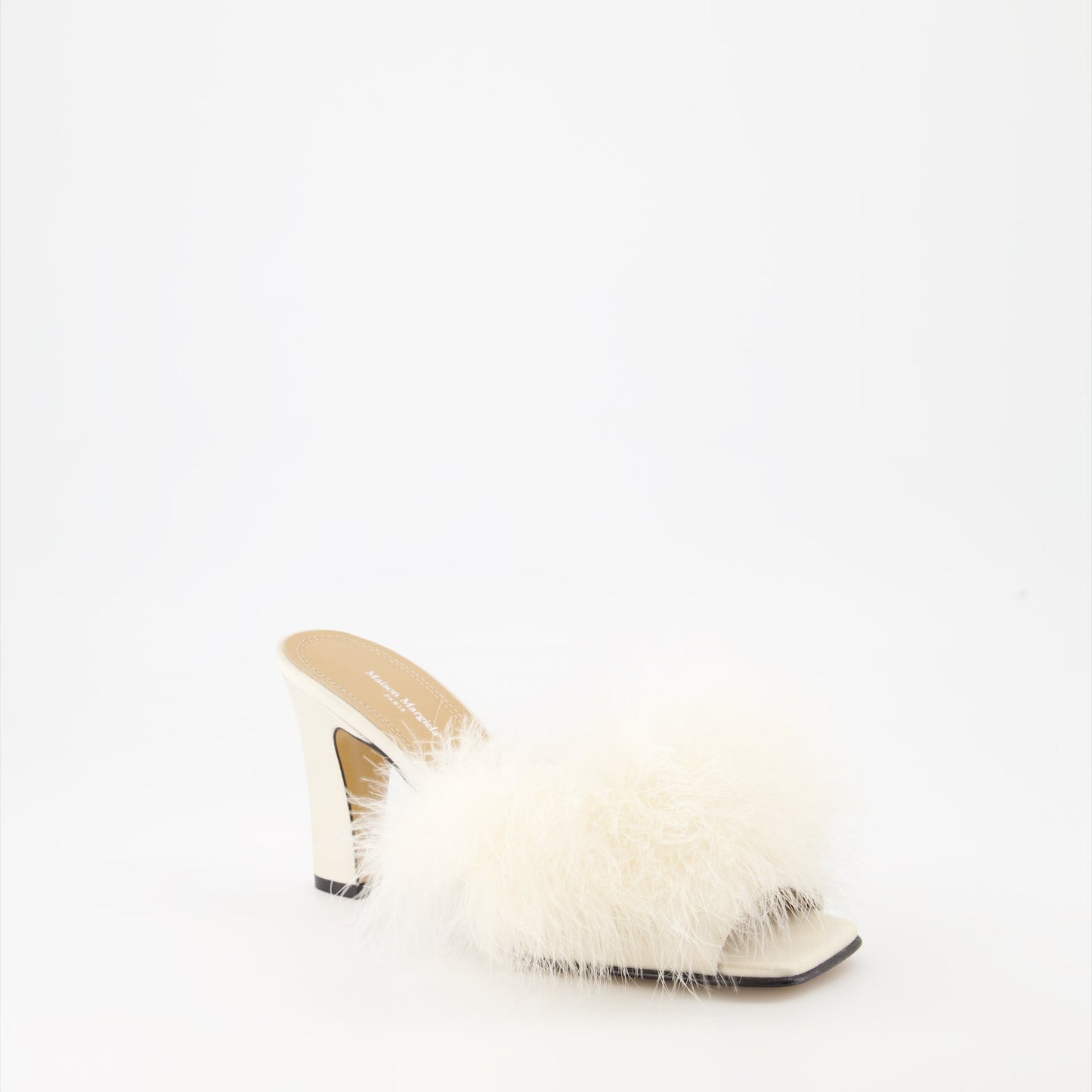 Maison Margiela, feather-trimmed mules, luxury footwear, designer shoes, elegant mules