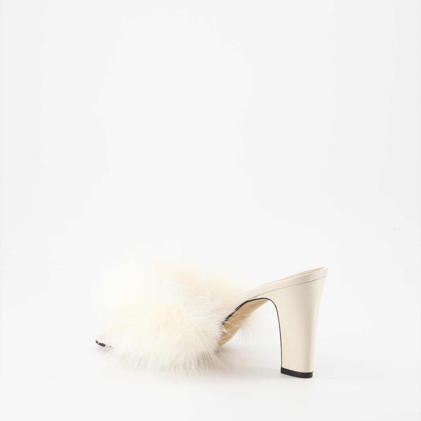 Maison Margiela, feather-trimmed mules, luxury footwear, designer shoes, elegant mules