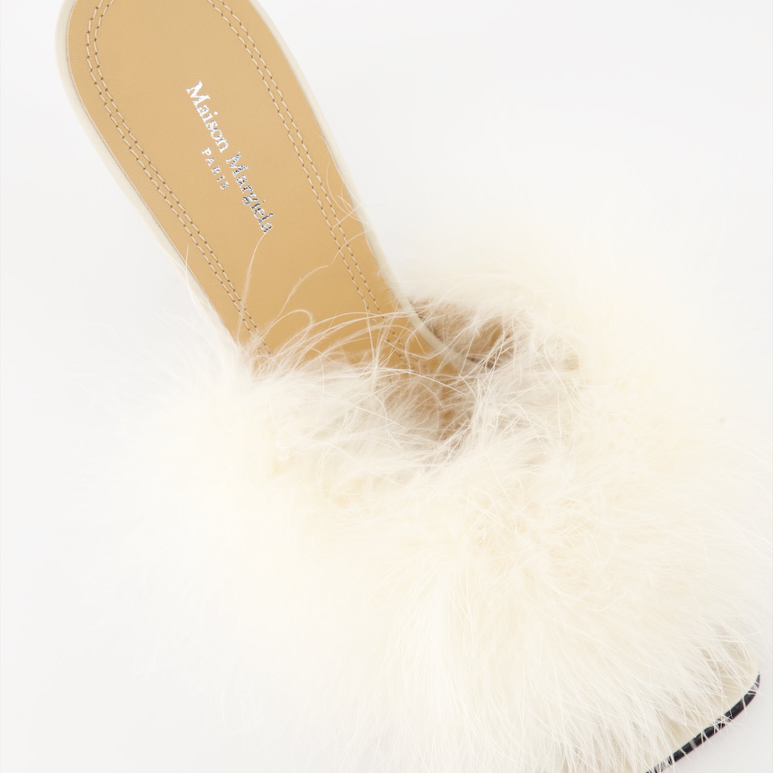 Maison Margiela, feather-trimmed mules, luxury footwear, designer shoes, elegant mules