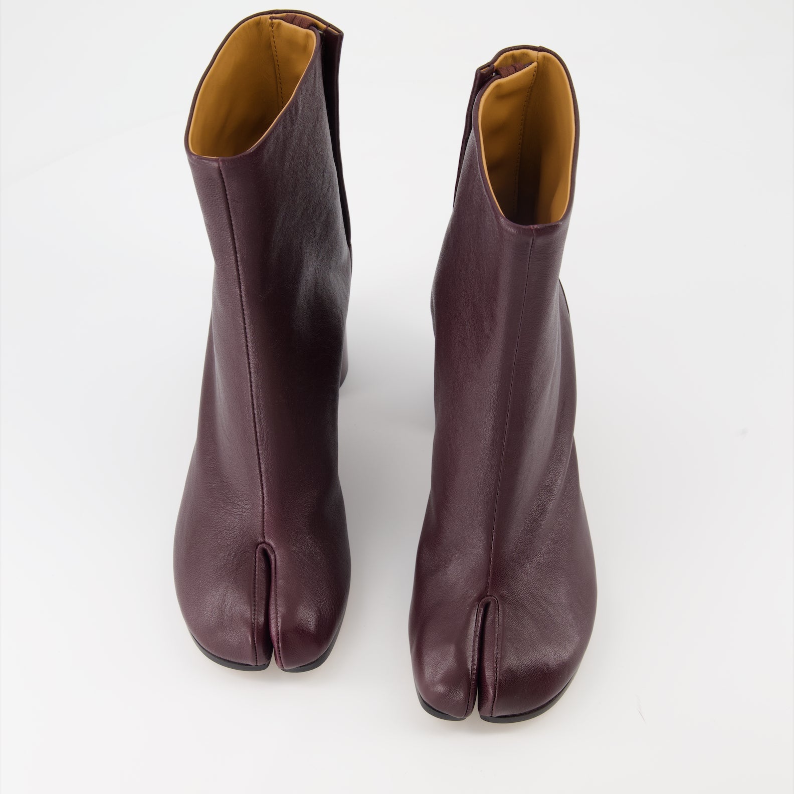 Tabi boots, Maison Margiela boots, leather ankle boots, luxury footwear, designer boots