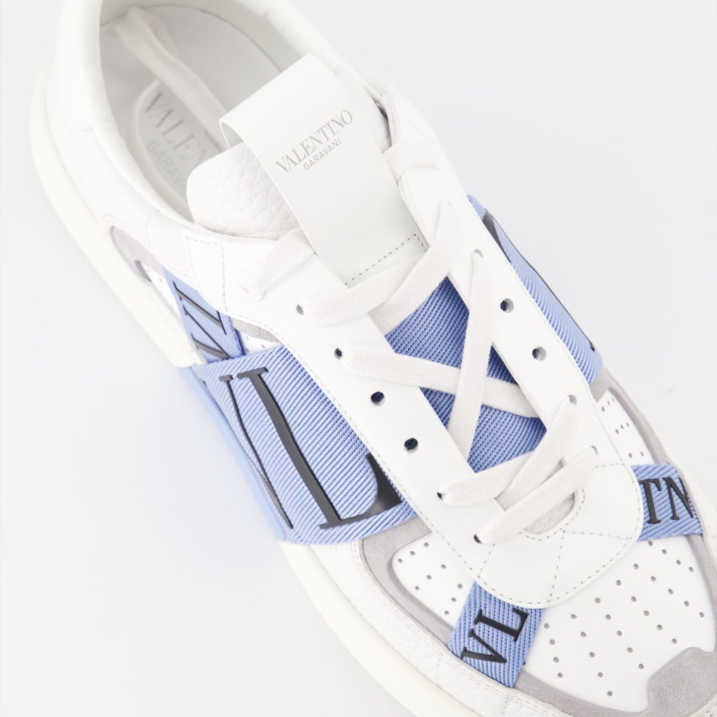 Valentino sneakers, white leather sneakers, blue strap sneakers, luxury footwear, designer sneakers