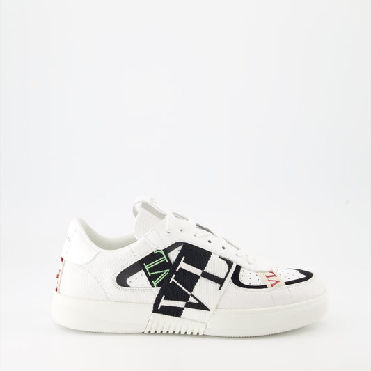 Valentino Garavani sneakers, luxury leather sneakers, white sneakers with black details, designer footwear, high-end fashion sneakers