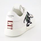 Valentino Garavani sneakers, luxury leather sneakers, white sneakers with black details, designer footwear, high-end fashion sneakers