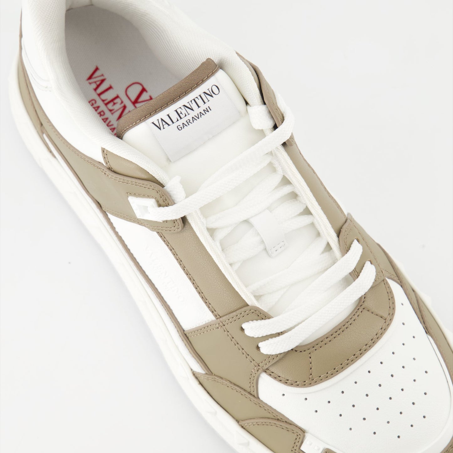 Valentino Garavani, designer sneakers, luxury footwear, leather sneakers, Freedots sneakers