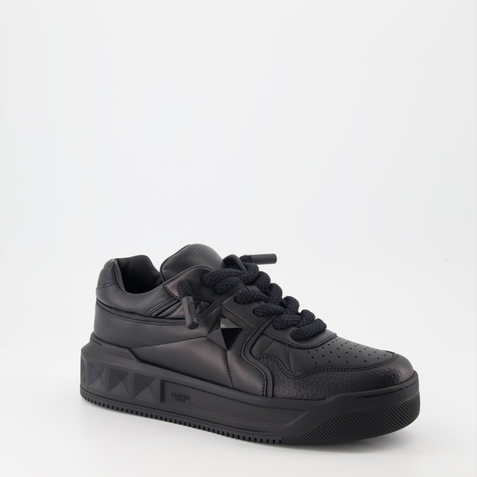 Valentino Garavani sneakers, black leather sneakers, luxury footwear, designer sneakers, Valentino rockstud