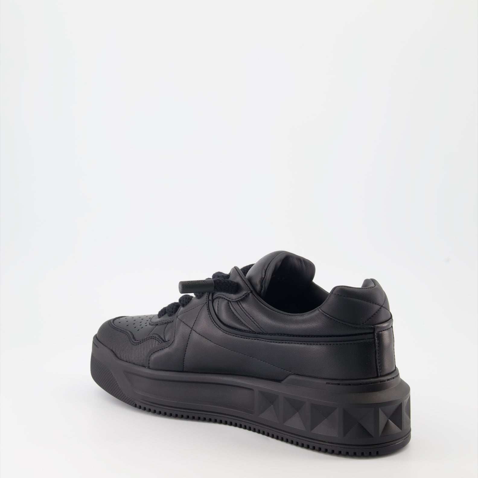 Valentino Garavani sneakers, black leather sneakers, luxury footwear, designer sneakers, Valentino rockstud