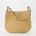 Rockstud bag, beige leather bag, Valentino hobo, luxury handbag, designer accessory