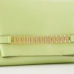 Victoria Beckham, green leather pochette, chain strap bag, luxury accessory, designer handbag