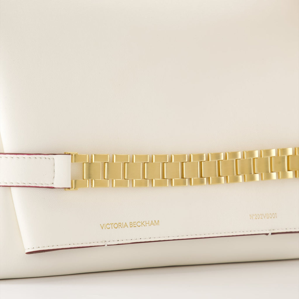 Victoria Beckham, white leather pouch, medium chain bag, luxury accessory, sophisticated style