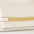 Victoria Beckham, white leather pouch, medium chain bag, luxury accessory, sophisticated style