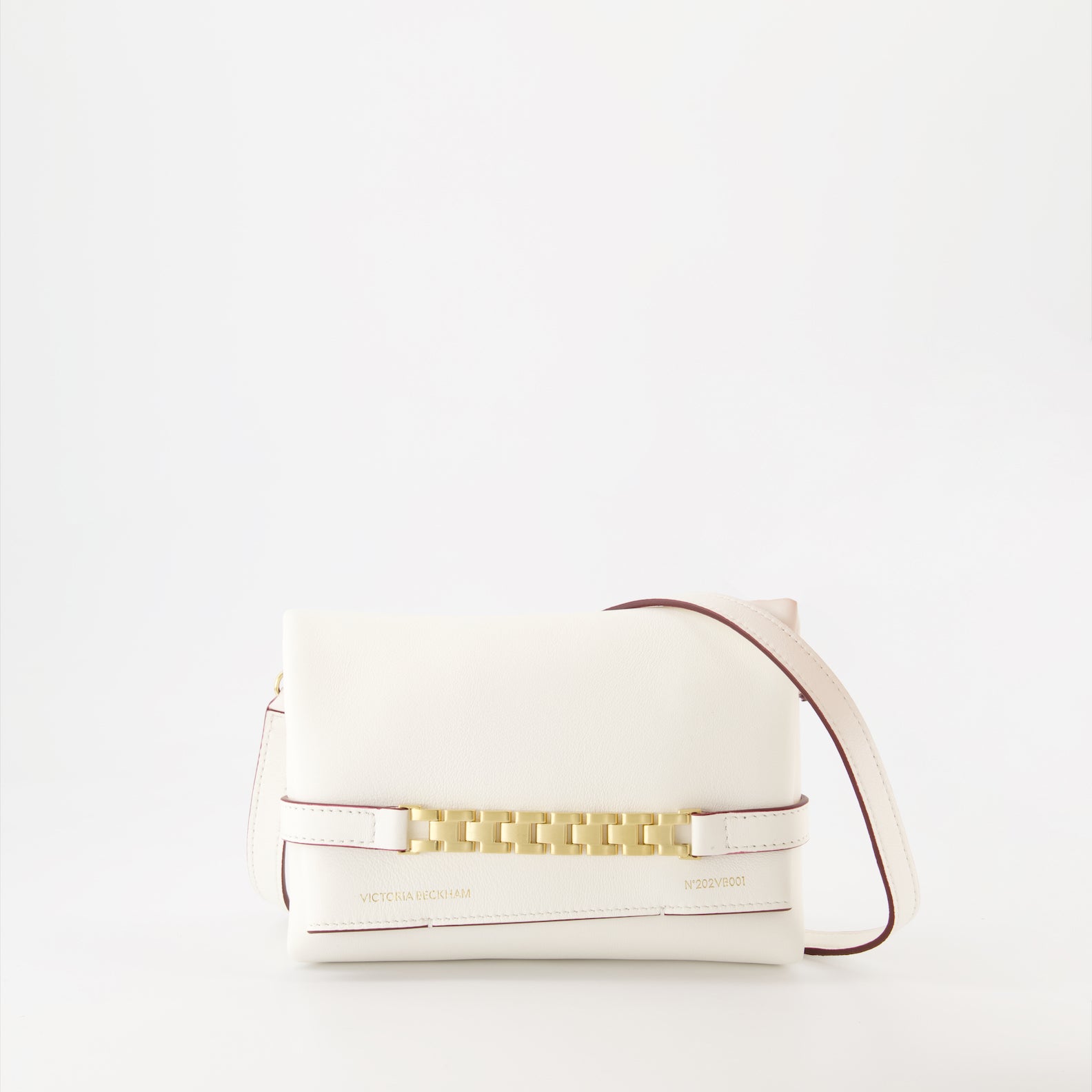 White leather pochette, luxury chain bag, Victoria Beckham accessories, elegant white clutch, high-end fashion
