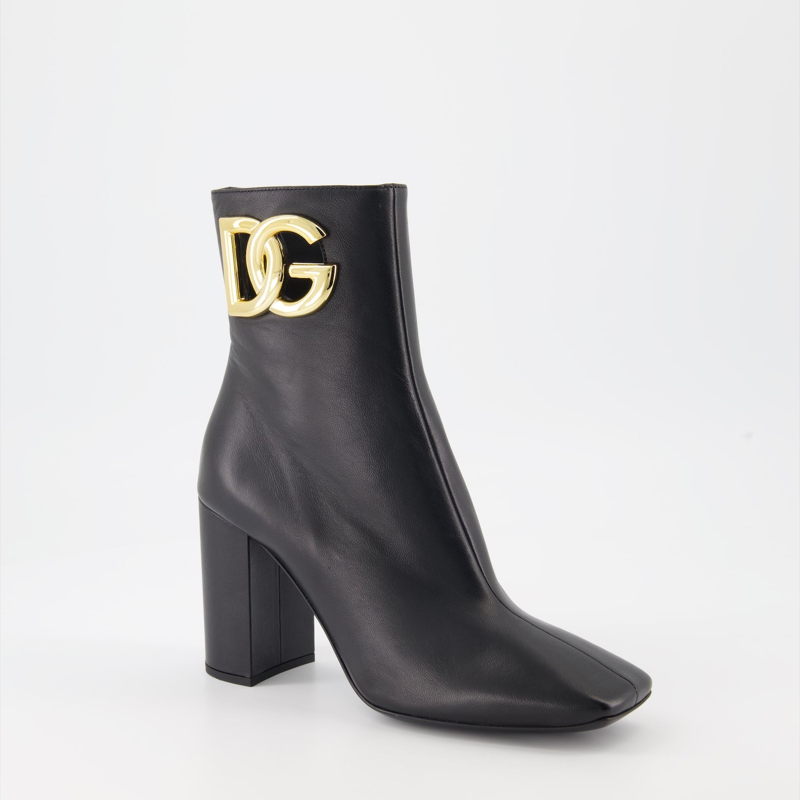 High-heel leather boots, Dolce & Gabbana ankle boots, luxury Italian footwear, designer leather boots, elegant high-heel shoes