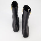 High-heel leather boots, Dolce & Gabbana ankle boots, luxury Italian footwear, designer leather boots, elegant high-heel shoes