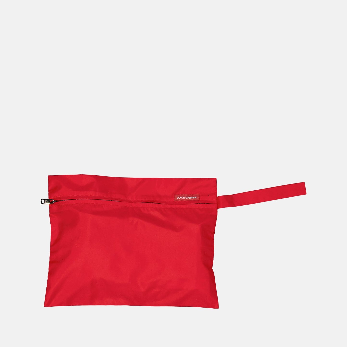 red swim shorts, luxury swimwear, Dolce & Gabbana, logo plaque swim shorts, designer swimwear