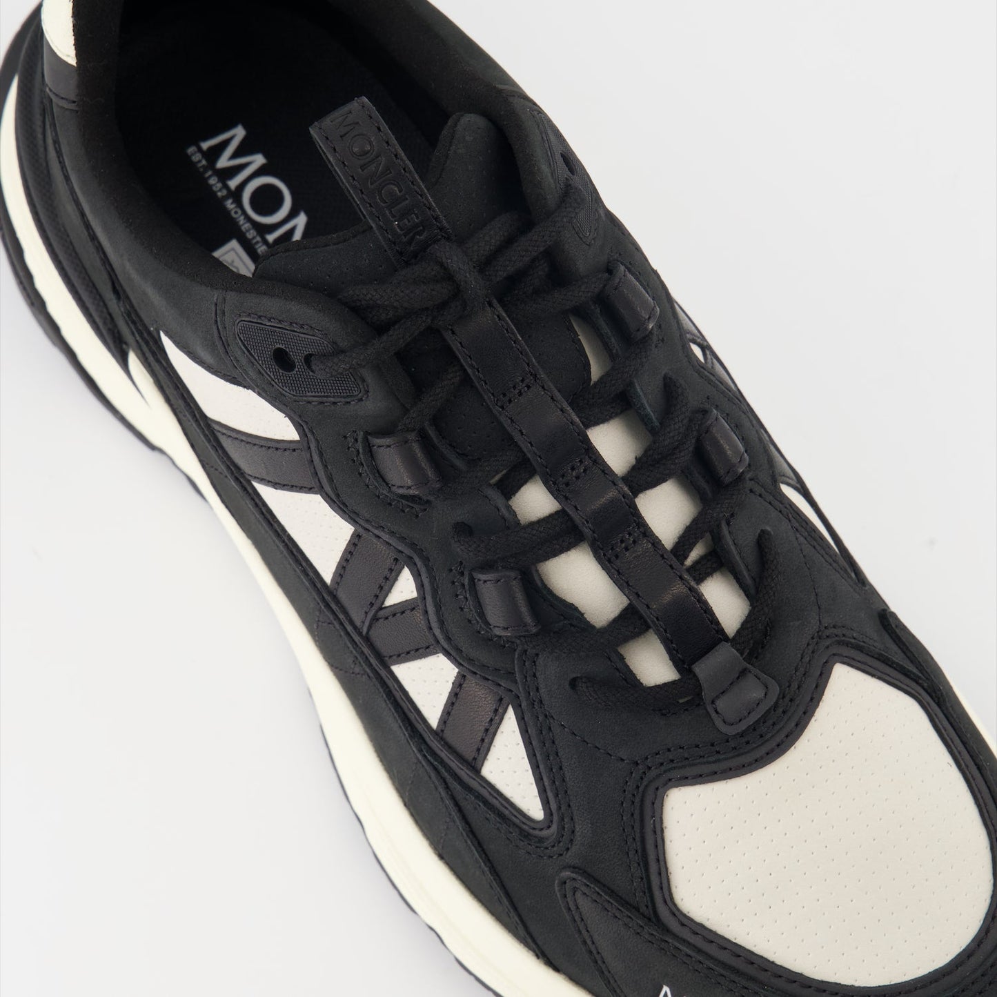 luxury sneakers, Moncler shoes, black leather sneakers, beige suede sneakers, high-end footwear