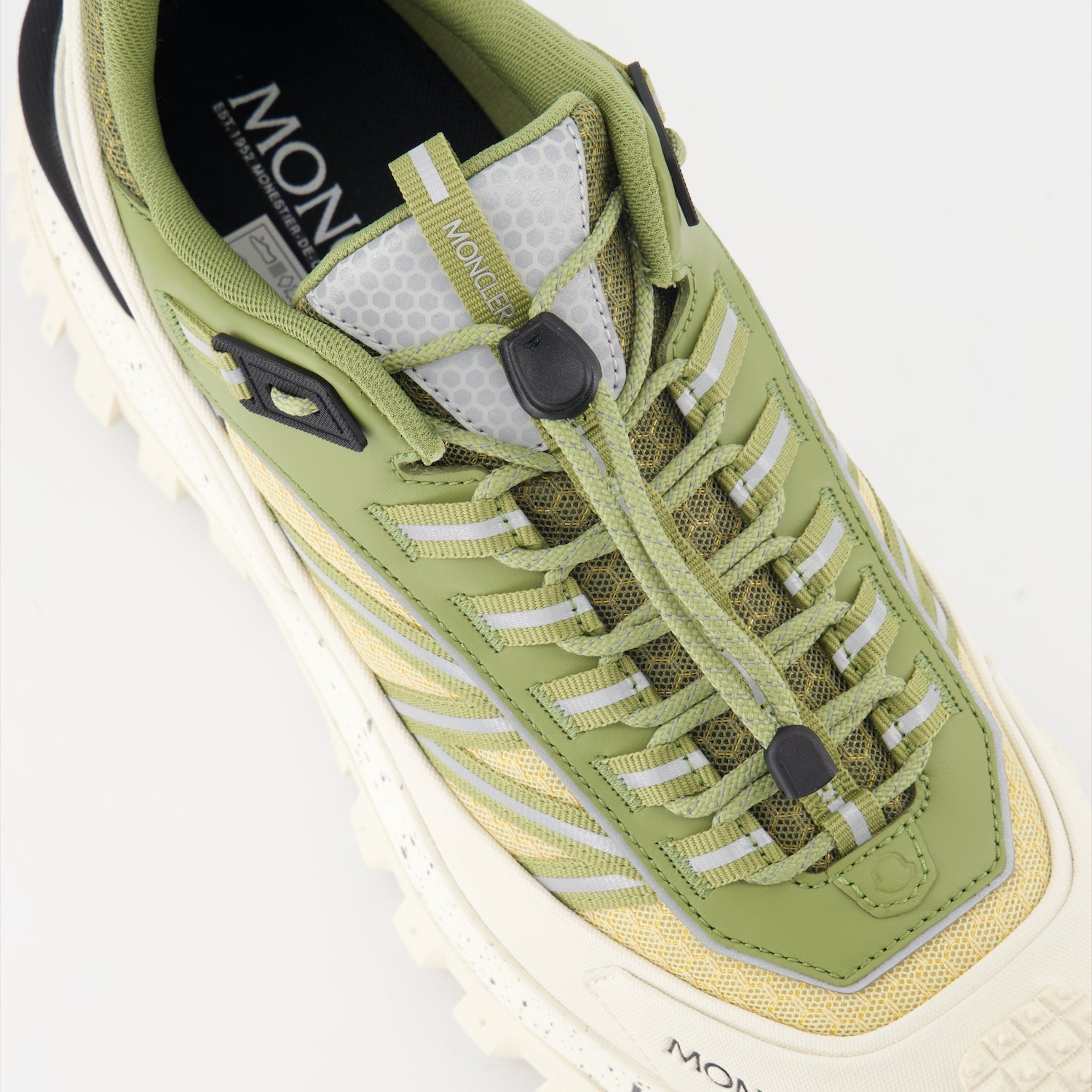 Moncler sneakers, luxury footwear, Trailgrip sneakers, green and beige sneakers, high-end fashion shoes