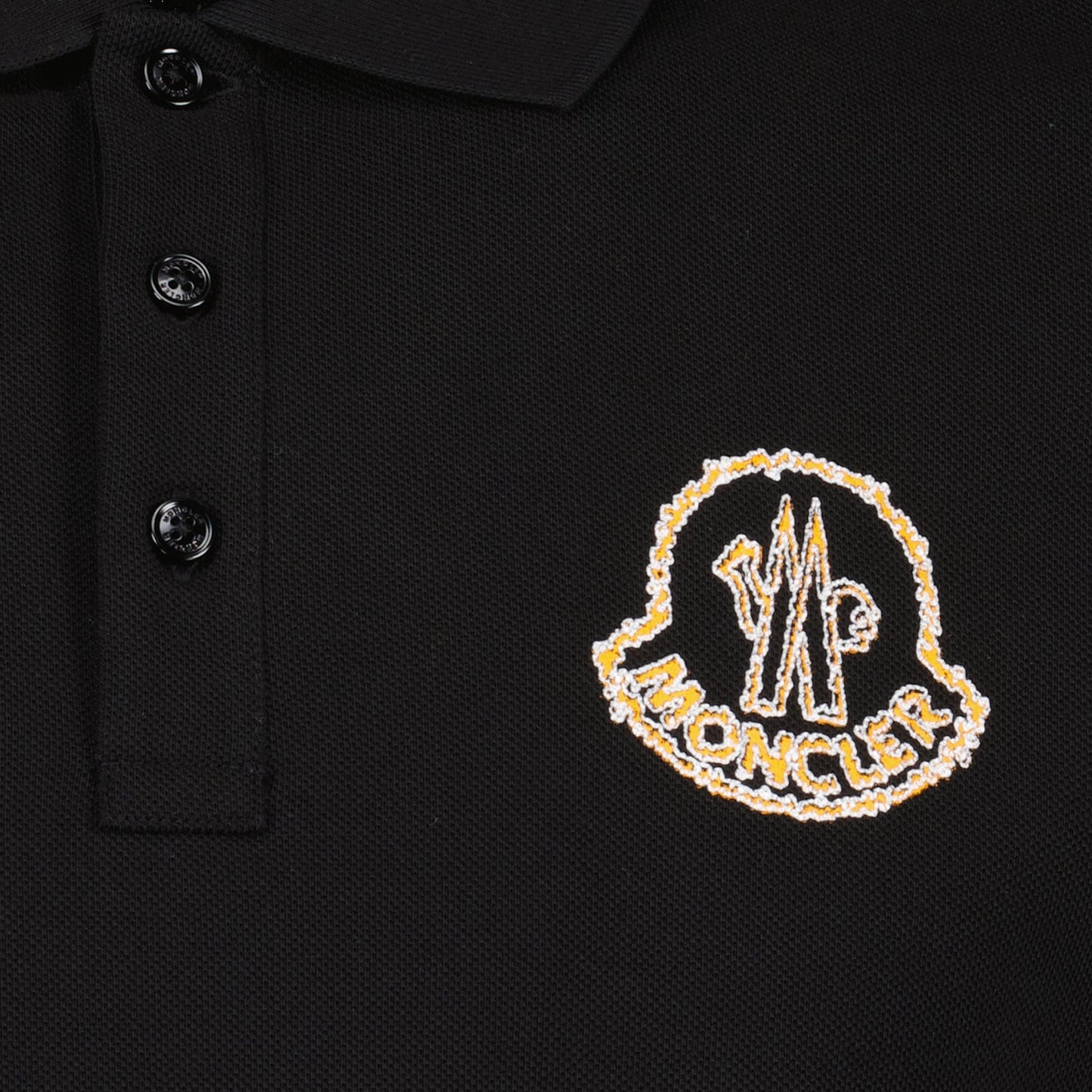 Moncler polo, black logo polo, luxury menswear, designer polo shirts, high-end fashion