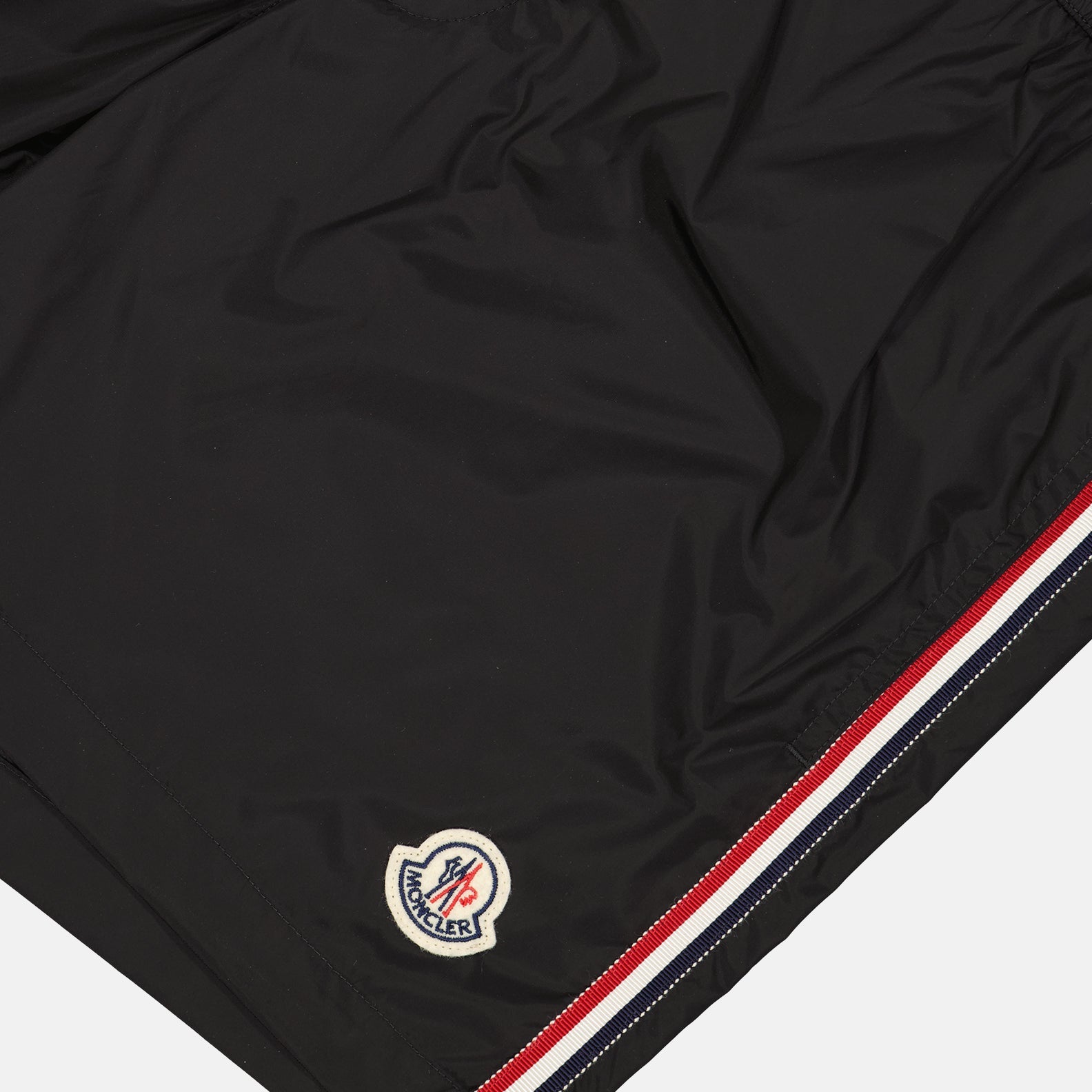 Luxury swim shorts, Moncler swimwear, tricolor trim swim shorts, black swim shorts, designer beachwear