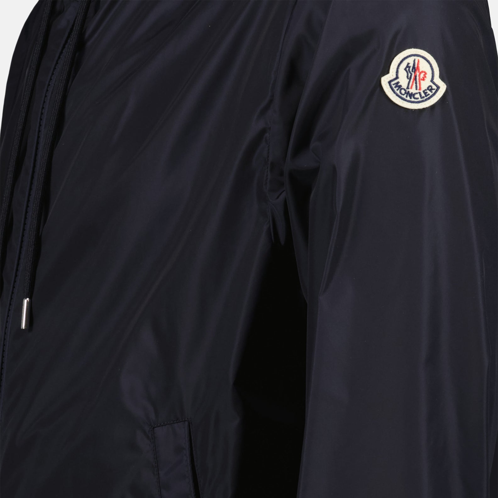 Moncler jacket, blue nylon jacket, luxury outerwear, fashion-forward, high-end jackets
