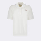 Immagine della polo bianca classica con logo di Moncler per donne - Stagione primavera-estate 2024 - Vista frontale
