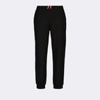 Moncler jogging pants, luxury athleisure, black logo pants, designer joggers, premium comfort wear
