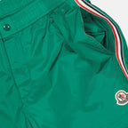 luxury swim shorts, green swimwear, tricolor trim shorts, Moncler beachwear, refined swim shorts