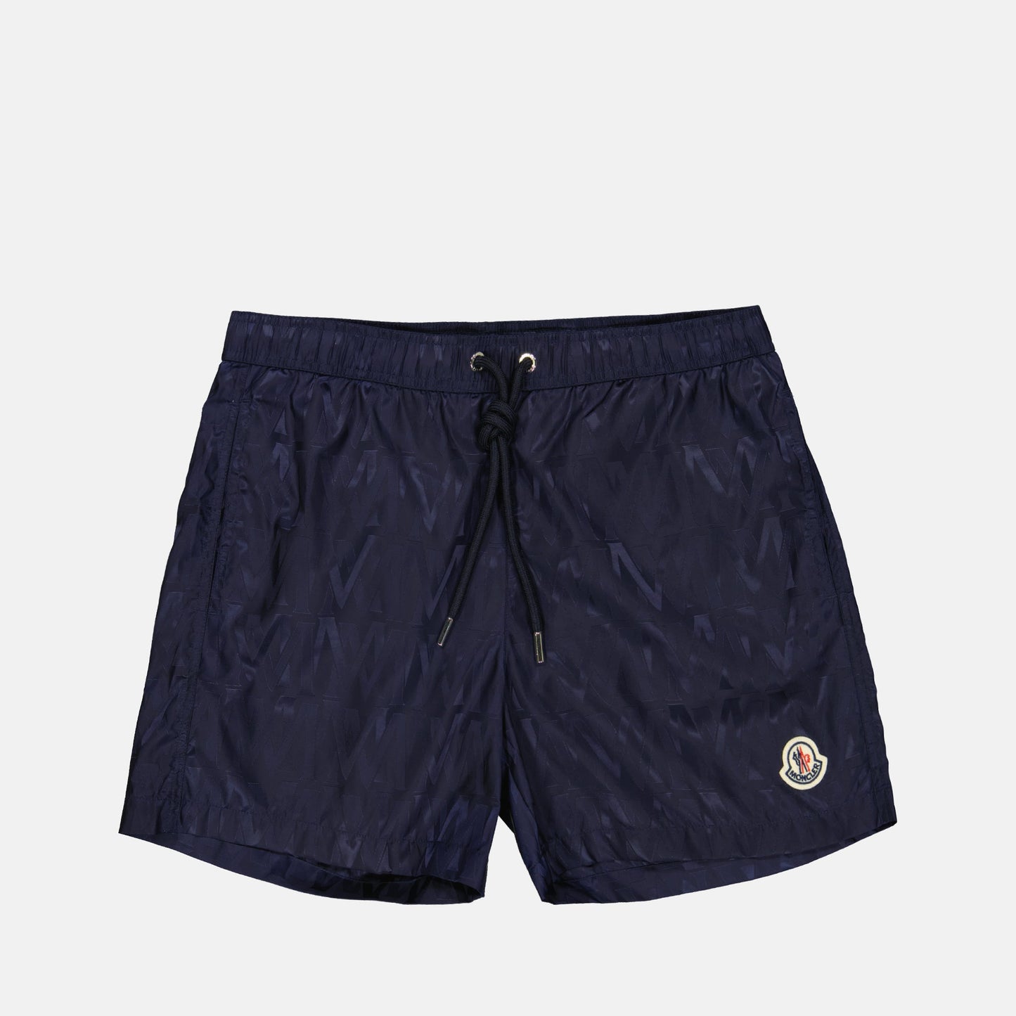 Monogrammed swim shorts, luxury men's swimwear, Moncler swim shorts, designer beachwear, high-end swimwear