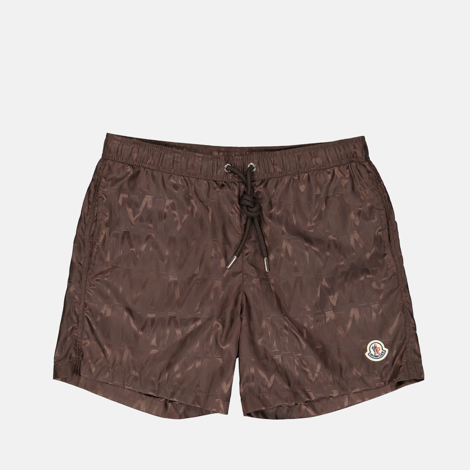 Moncler swim shorts, luxury swimwear, monogrammed shorts, designer beachwear, elegant swimwear