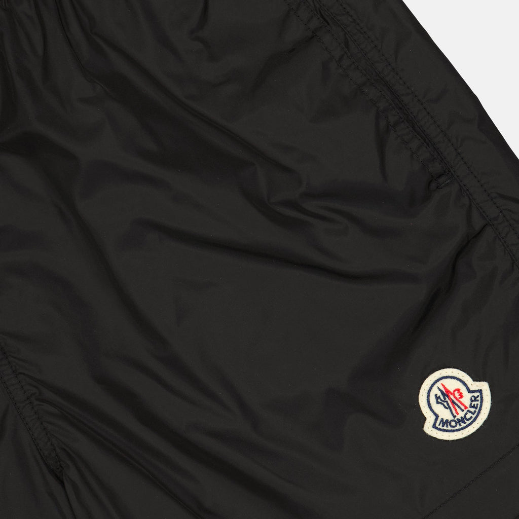 Moncler swim shorts, black swim shorts, luxury swimwear, designer swimwear, logo shorts